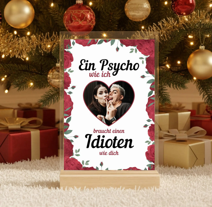 Hyperrealistic photo of an acrylic glass display with a wooden base, sized 20 × 30 cm, featuring the same cartoon-style illustration of the blonde woman and her Labrador as in the referenced image