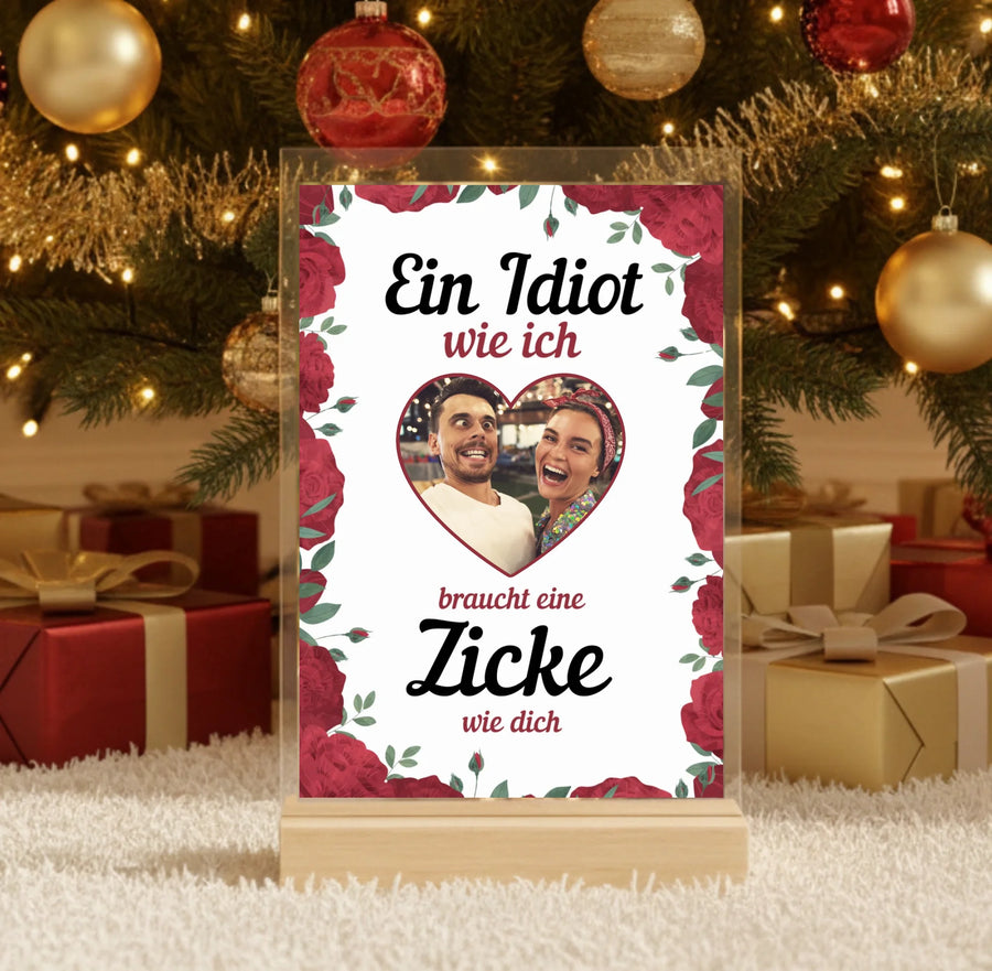 Hyperrealistic photo of an acrylic glass display with a wooden base, sized 20 × 30 cm, featuring the same cartoon-style illustration of the blonde woman and her Labrador as in the referenced image